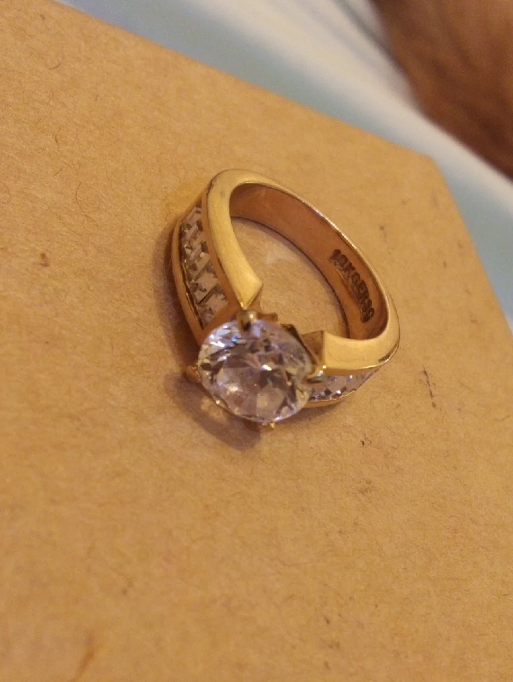 Classic Gold Solitaire Engagement Ring with Clear Center Stone
